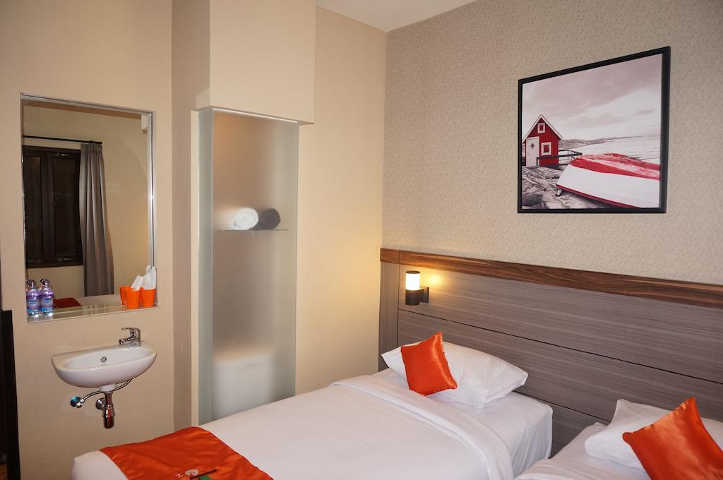 Ekon Hotel Джокьякарта Номер фото