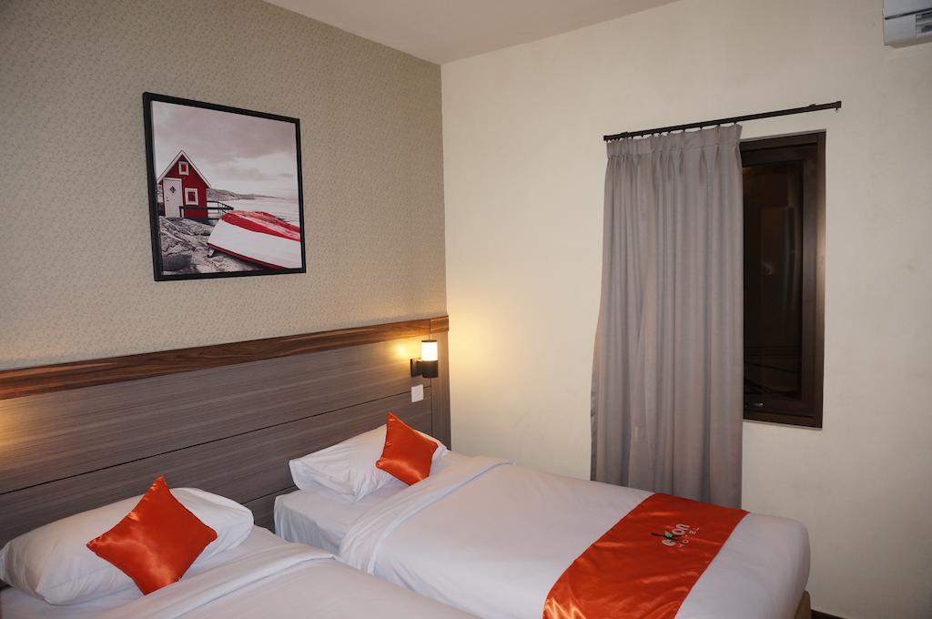 Ekon Hotel Джокьякарта Номер фото