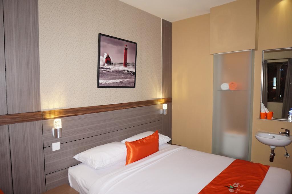 Ekon Hotel Джокьякарта Номер фото