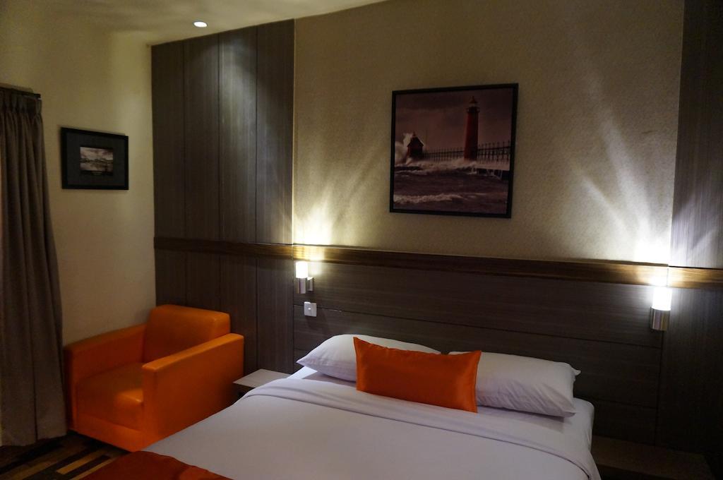 Ekon Hotel Джокьякарта Номер фото